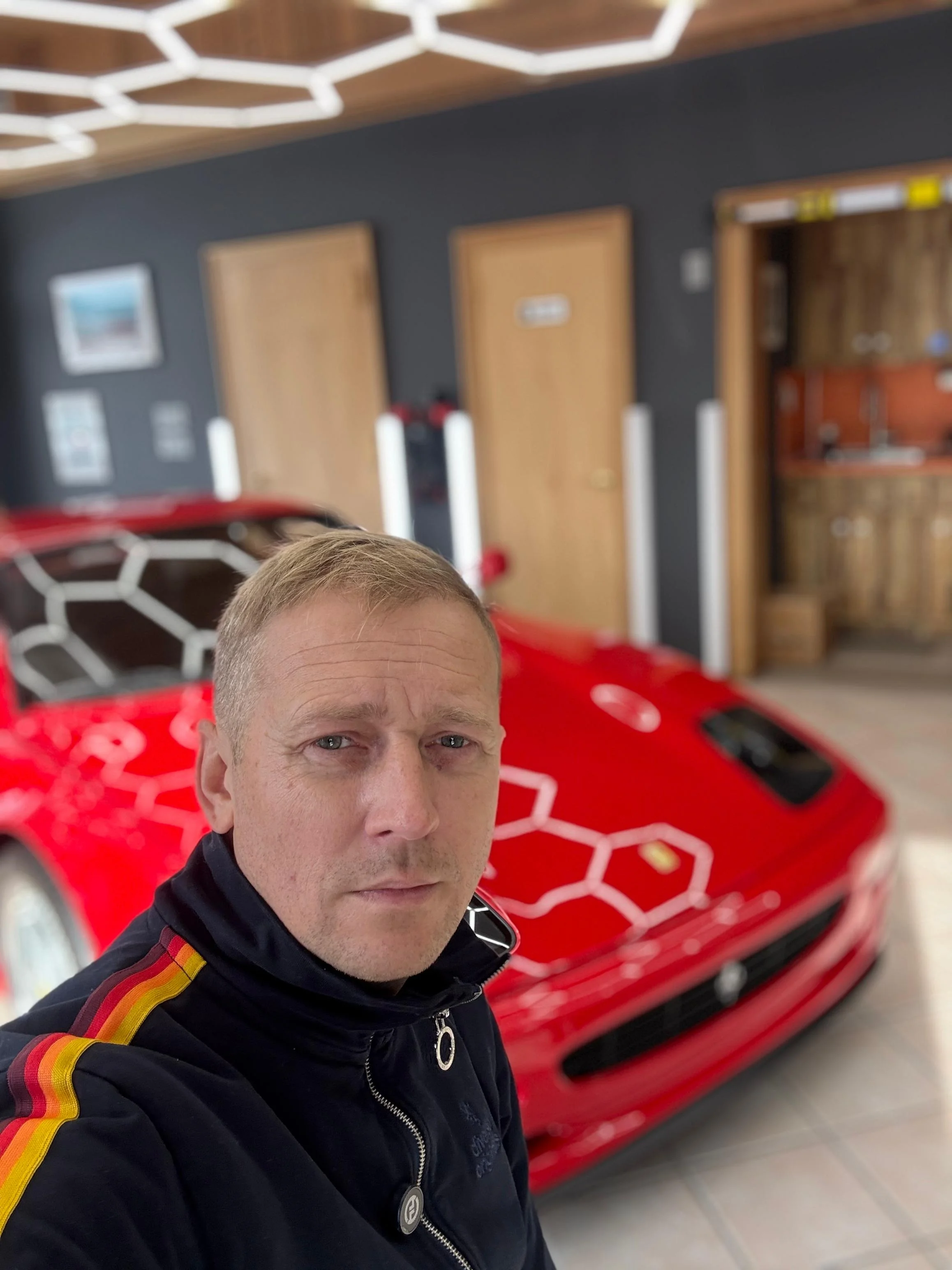 Mike Żyliński at Moto Galaxy Detailing shop in Oakdale, NY